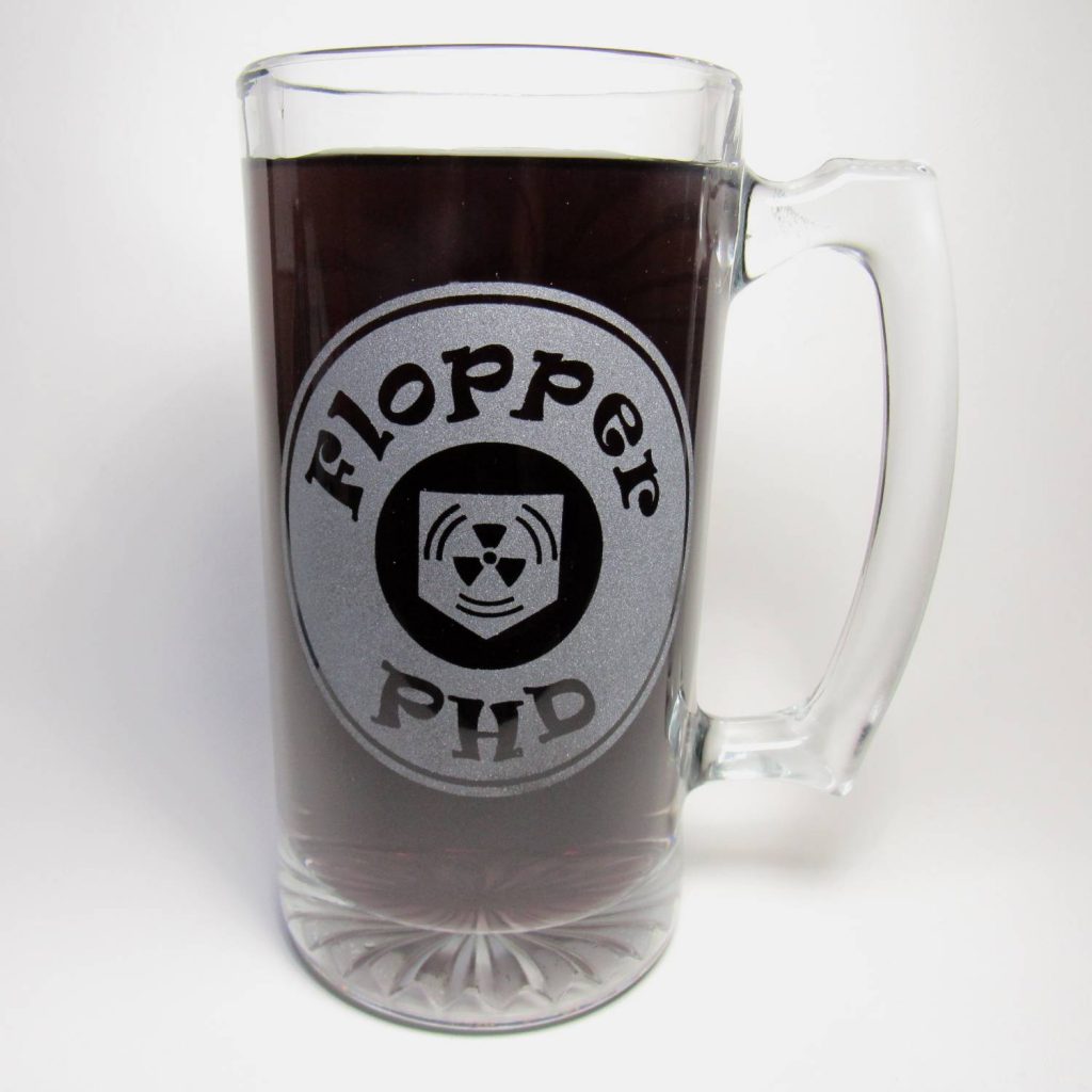 PhD flopper beer mug filled with a dark purple liquid, front side visible.